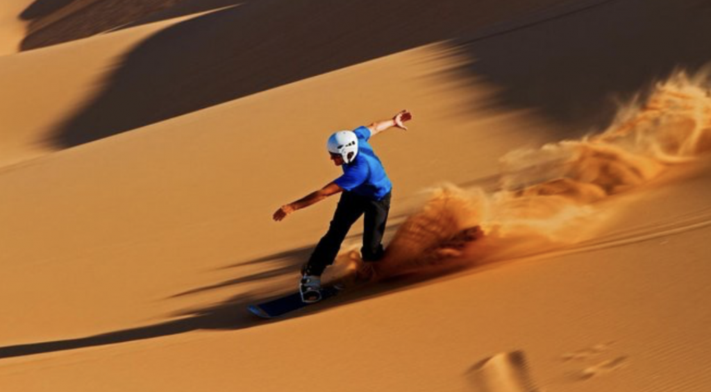 Sandboarding desert Dubai